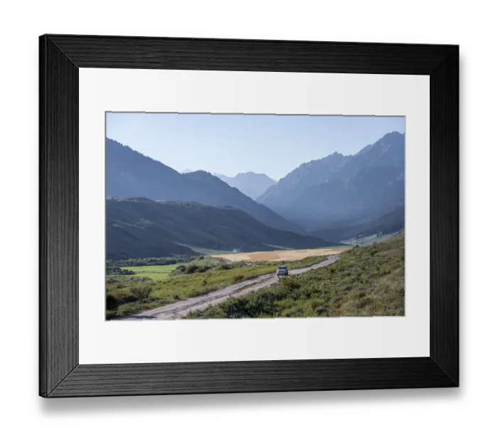 Framed Print : Car on gravel road, Tien Shan Mountains Framed Print : Car on gravel road, Tien Shan Mountains