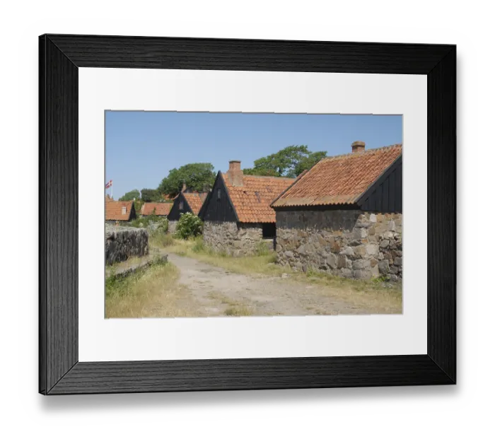 Framed Print : Old stonehouses in the old Christiansoe Fortress