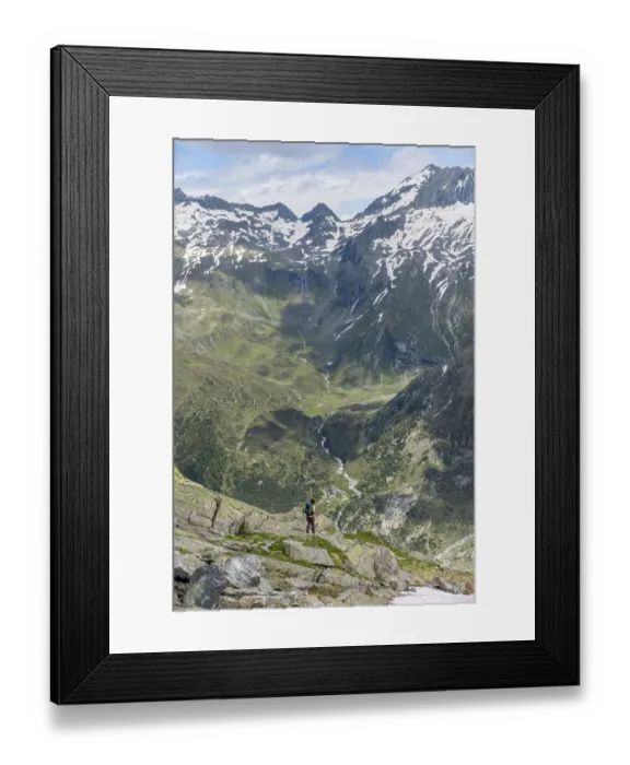 Framed Print : Mountaineer in front of picturesque mountain landscape Framed Print : Mountaineer in front of picturesque mountain landscape