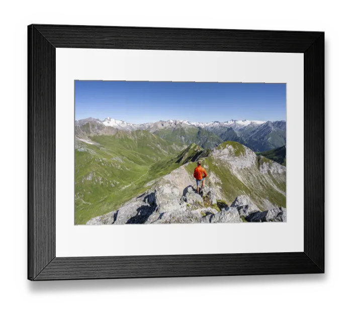 Framed Print : Mountaineer in front of mountain panorama with Grossvenediger Framed Print : Mountaineer in front of mountain panorama with Grossvenediger