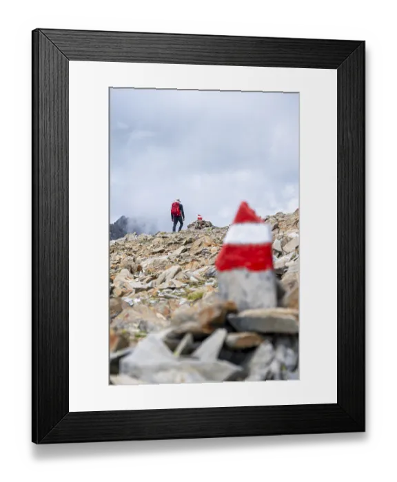 Framed Print : Red and white trail markings, hiker in the high mountains
