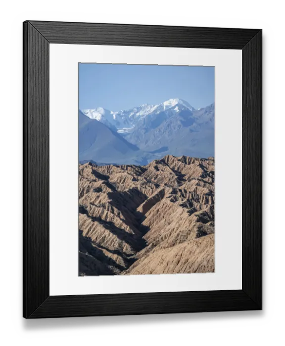 Framed Print : Canyons and eroded hilly landscape on mountains of the Tian Shan