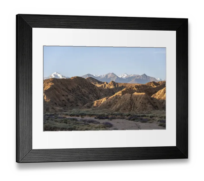 Framed Print : Sunrise over canyons, Tian Shan mountains in the background