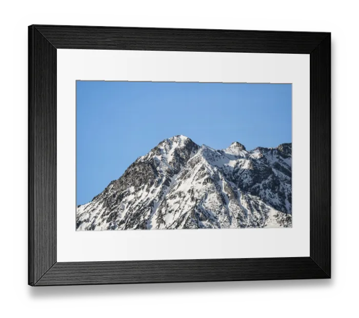 Framed Print : White mountain top with blue sky