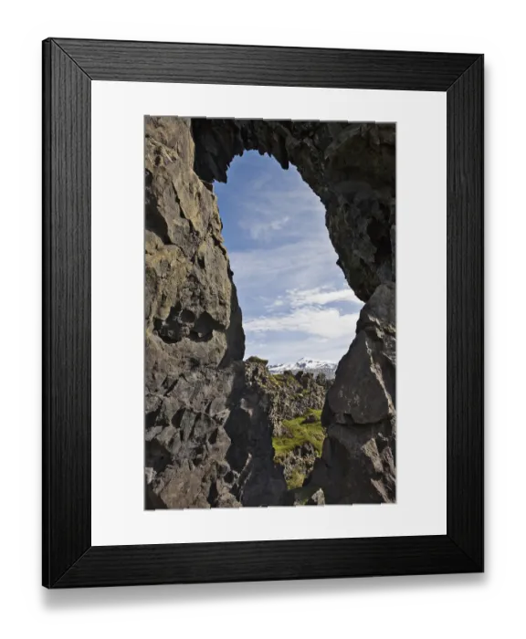 Framed Print : Rock window, lava rock formations with Mt