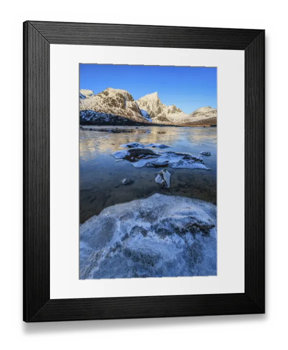 Framed Print : Icy fjord in front of steep mountains