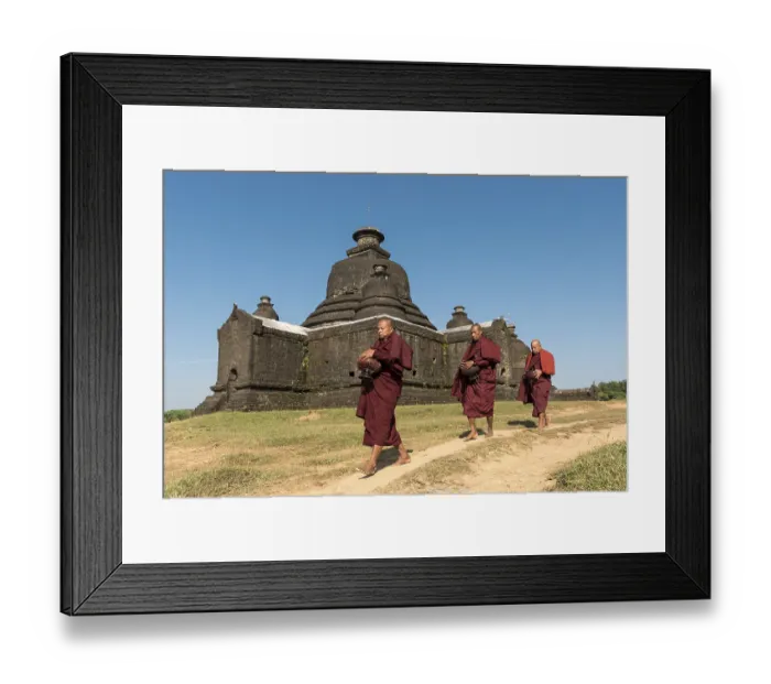Framed Print : Buddhist monks collect morning alms in front of Laymyetnha Paya