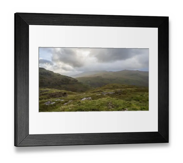 Framed Print : Typical landscape with mountains behind clouds in late summer Framed Print : Typical landscape with mountains behind clouds in late summer