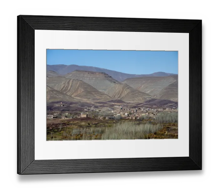 Framed Print : View of Taboulmante with colourful mountains in the background Framed Print : View of Taboulmante with colourful mountains in the background