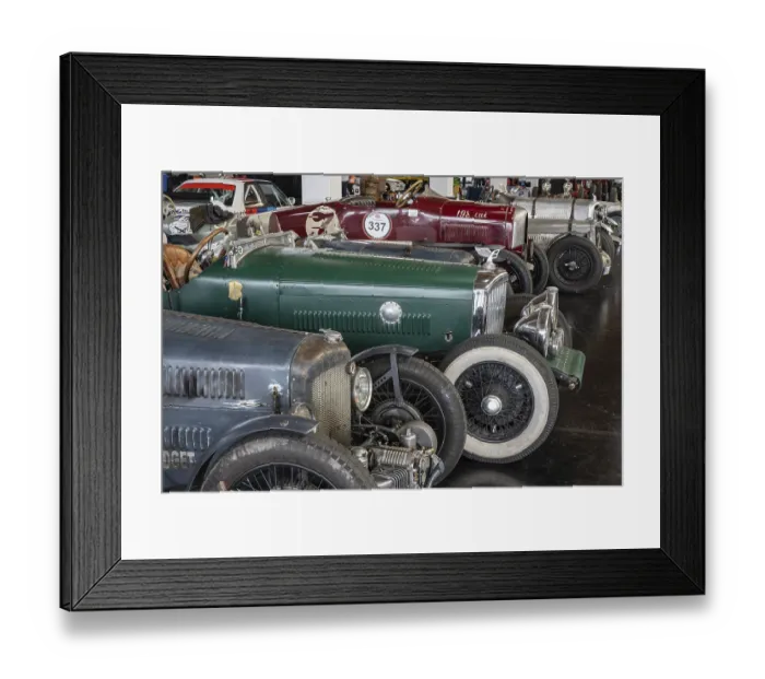 Framed Print : Historic racing cars lined up in a car park