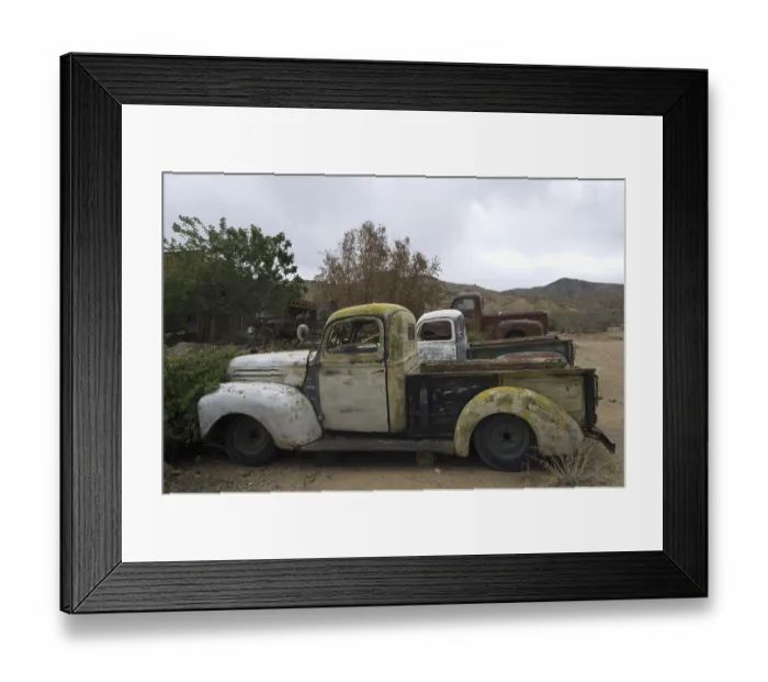 Framed Print : Old vintage pickup trucks along the Route 66 at the general store of the ghost town Hackberry in Arizona