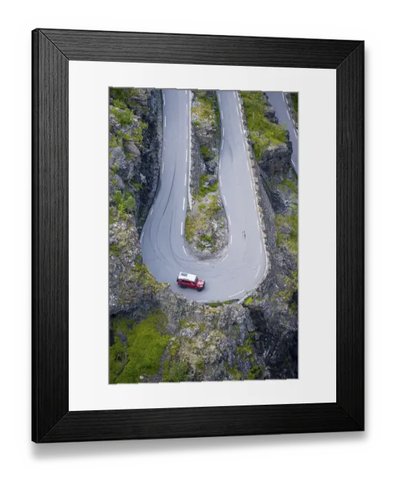 Framed Print : Single car, hairpin bend at the mountain road Trollstigen Framed Print : Single car, hairpin bend at the mountain road Trollstigen