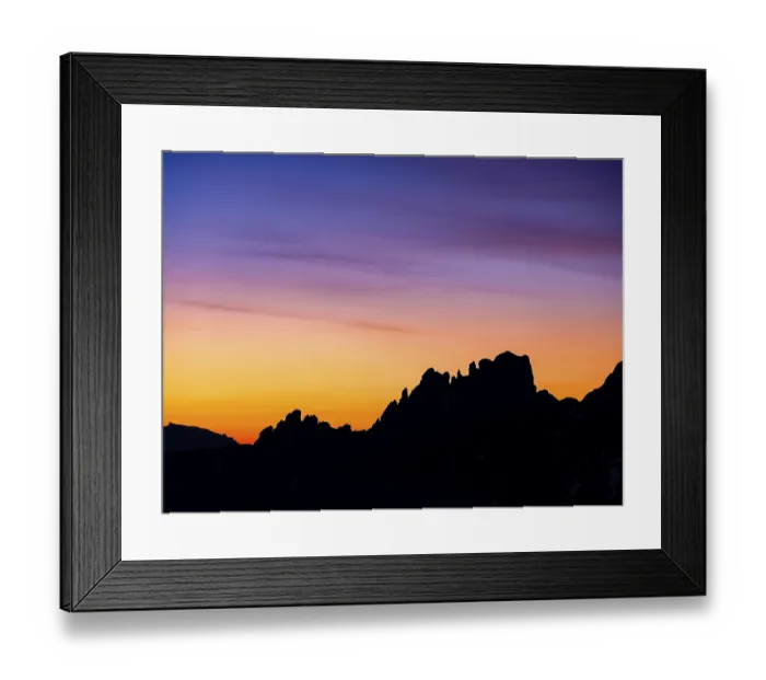 Framed Print : Rose garden group under a colourful sky at dawn