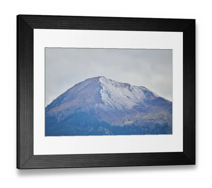 Framed Print : Mountain peak covered with snow in fall
