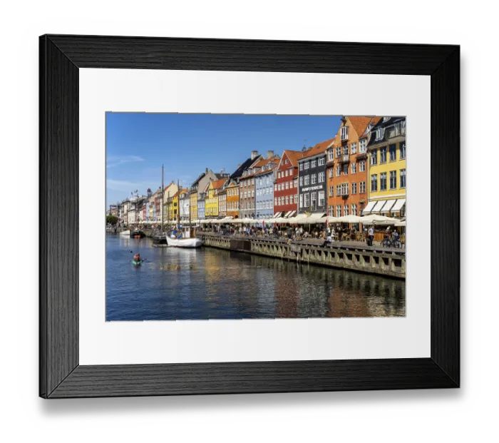 Framed Print : Colourful houses, restaurants and historic ships on the Nyhavn canal and harbour Framed Print : Colourful houses, restaurants and historic ships on the Nyhavn canal and harbour