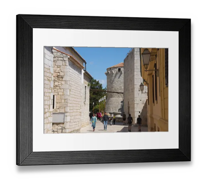 Framed Print : Picturesque old town centre with cobbled streets and old buildings