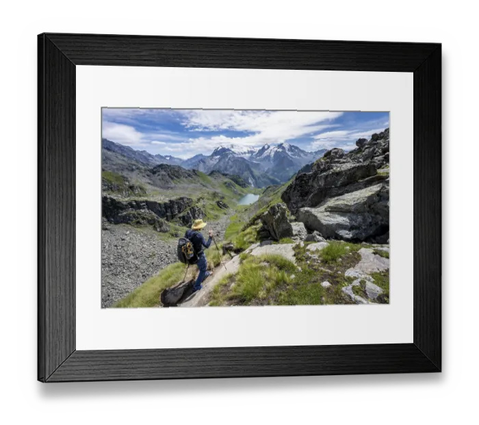 Framed Print : Mountaineer on hiking trail in mountain landscape