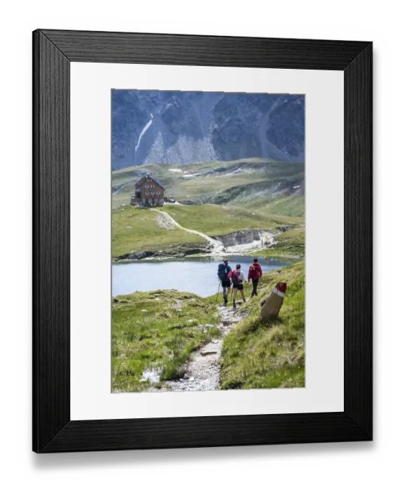 Framed Print : Hikers in front of the Neue Reichenberger Huette
