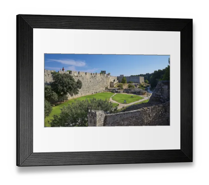 Framed Print : Grand Master's Palace, view of a medieval castle with courtyard and green lawn