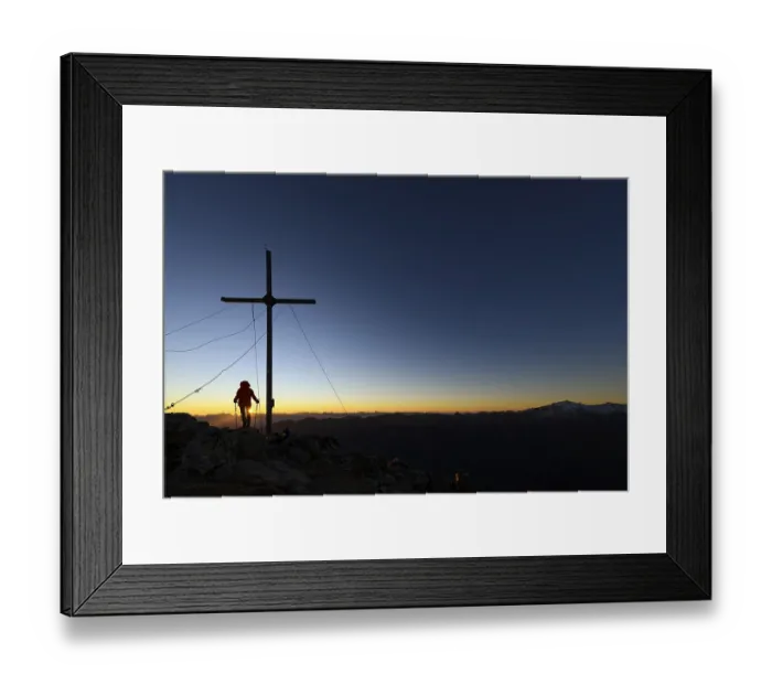 Framed Print : Vermoispitze summit cross with climber at sunrise with South Tyrolean mountains in the background