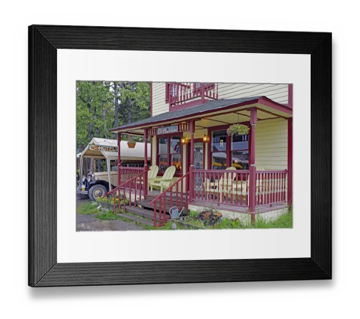 Framed Print : Old wooden hotel from the 1920s and a vintage car Framed Print : Old wooden hotel from the 1920s and a vintage car