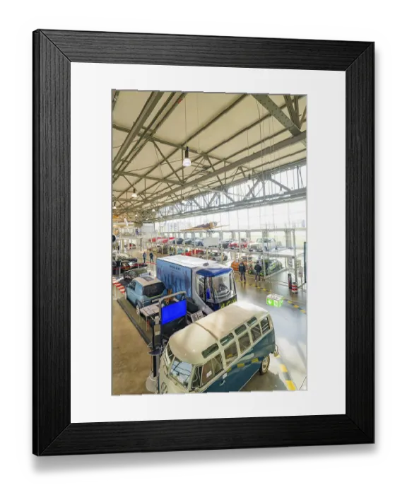 Framed Print : Large room with vintage and modern cars