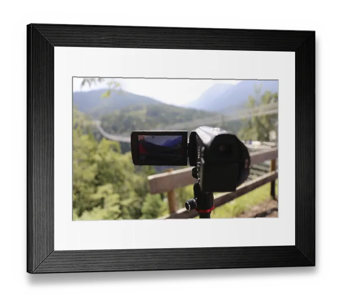 Framed Print : Close-up of a camcorder during video recording in nature Framed Print : Close-up of a camcorder during video recording in nature