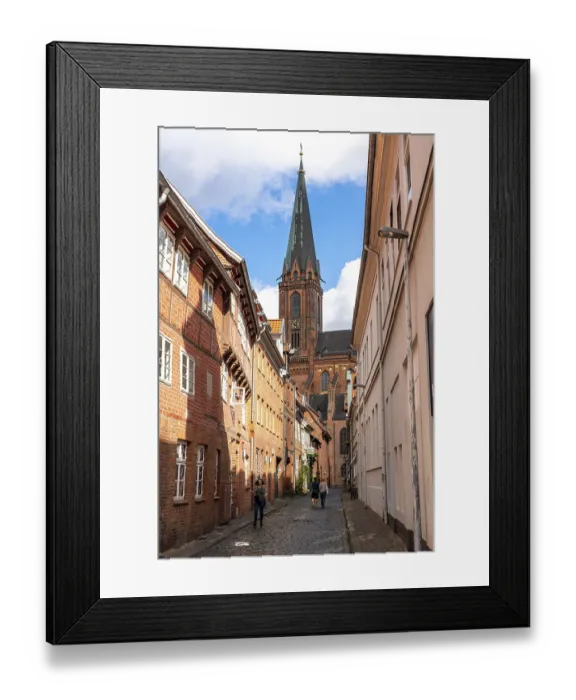 Framed Print : The old town of Lueneburg, view through Koltmannstrasse to St Framed Print : The old town of Lueneburg, view through Koltmannstrasse to St