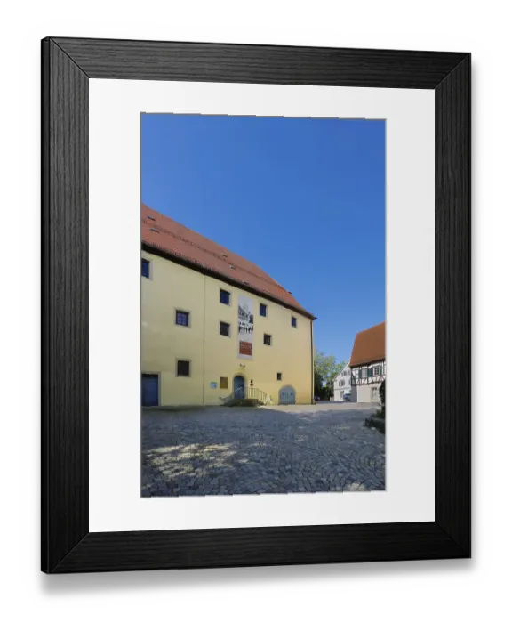 Framed Print : Ensemble of buildings at Muensingen Castle