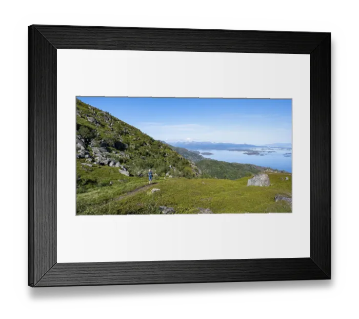 Framed Print : Hikers on trail to Dronningsvarden or Stortinden