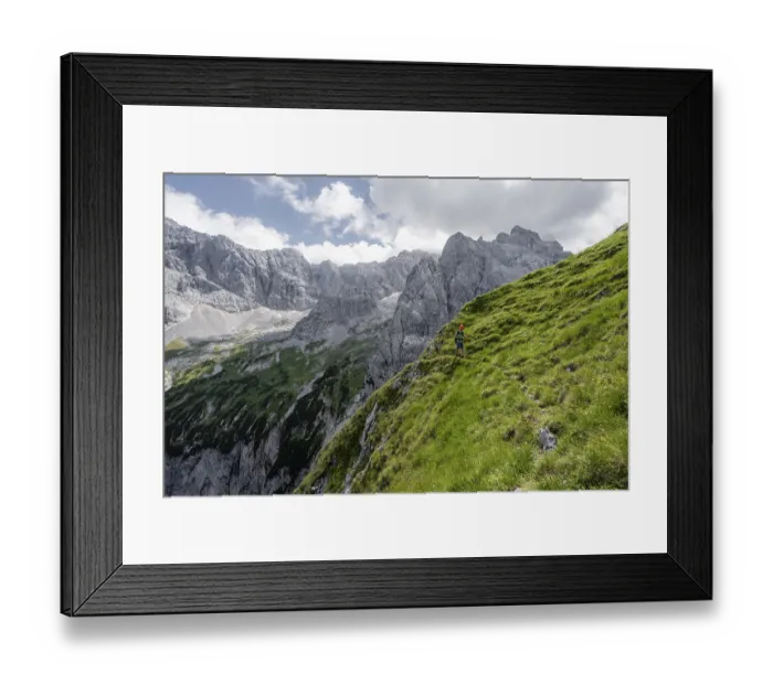 Framed Print : Mountaineer in steep terrain on the Schafsteig on the Waxenstein ridge