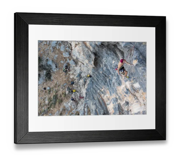 Framed Print : Climber climbing on a rock face Framed Print : Climber climbing on a rock face