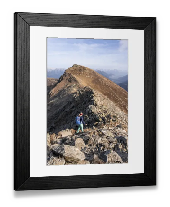 Framed Print : Mountaineer in the mountains in autumn