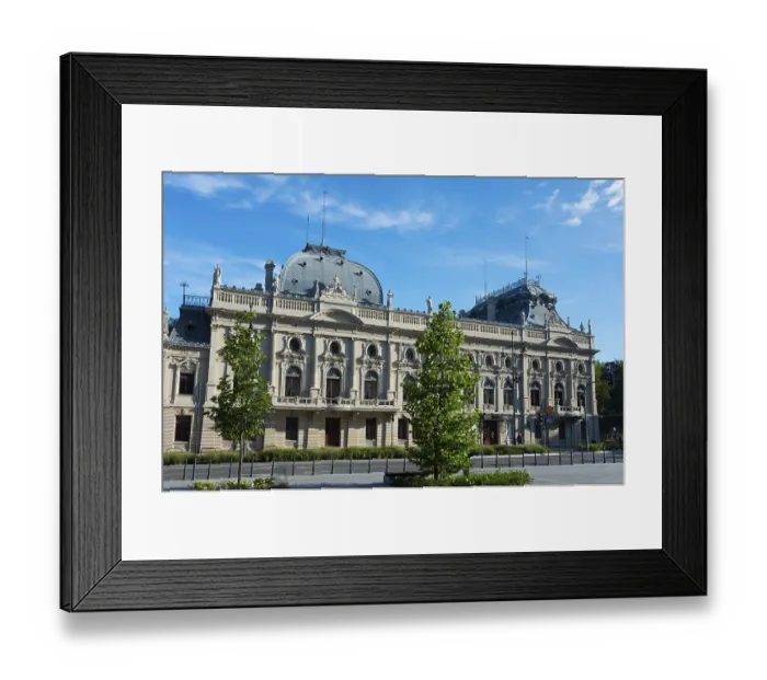 Framed Print : An imposing historic building with an ornate facade and baroque elements under a clear blue sky