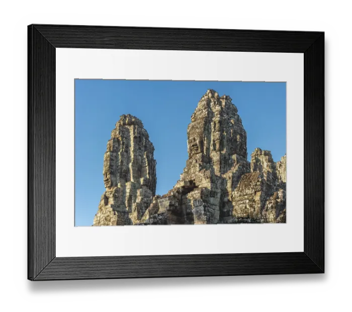 Framed Print : Panoramic image of giant stone-carved faces of the Bodhisattva Lokeshvara Framed Print : Panoramic image of giant stone-carved faces of the Bodhisattva Lokeshvara