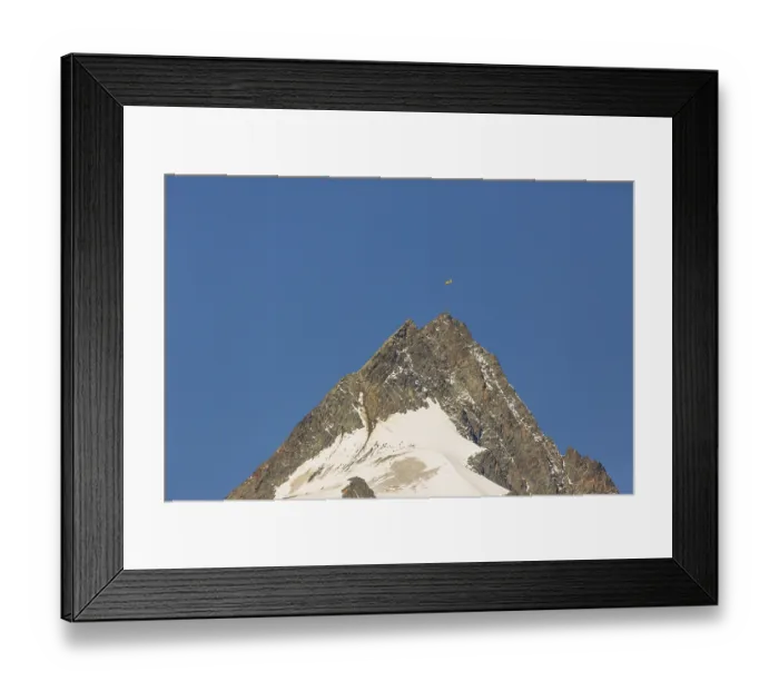 Framed Print : Air rescue. A climber is rescued from the Grossglockner mountain by helicopter