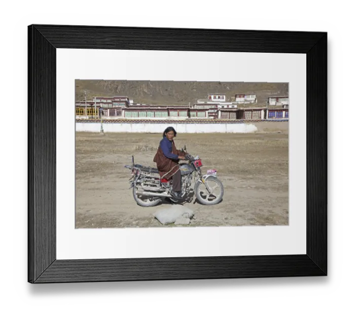Framed Print : Tibetan man riding motorbike in front of monastery between Sershu Dzong and Sershu Framed Print : Tibetan man riding motorbike in front of monastery between Sershu Dzong and Sershu
