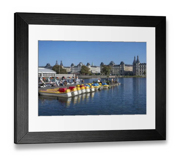 Framed Print : People enjoying leisure time on a jetty by the water Framed Print : People enjoying leisure time on a jetty by the water