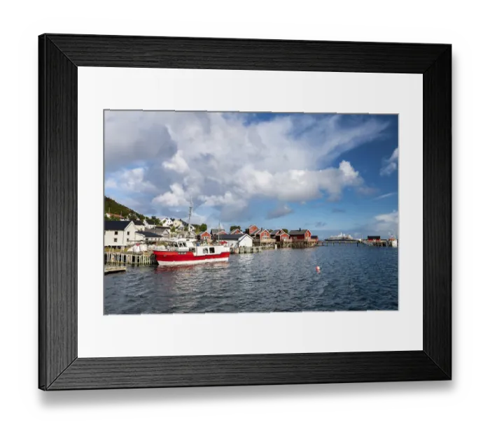 Framed Print : Rorbuer cabins and fishing boat in Reine