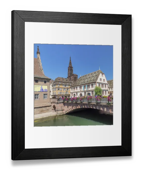 Framed Print : View across the Ill River to the historical museum and cathedral