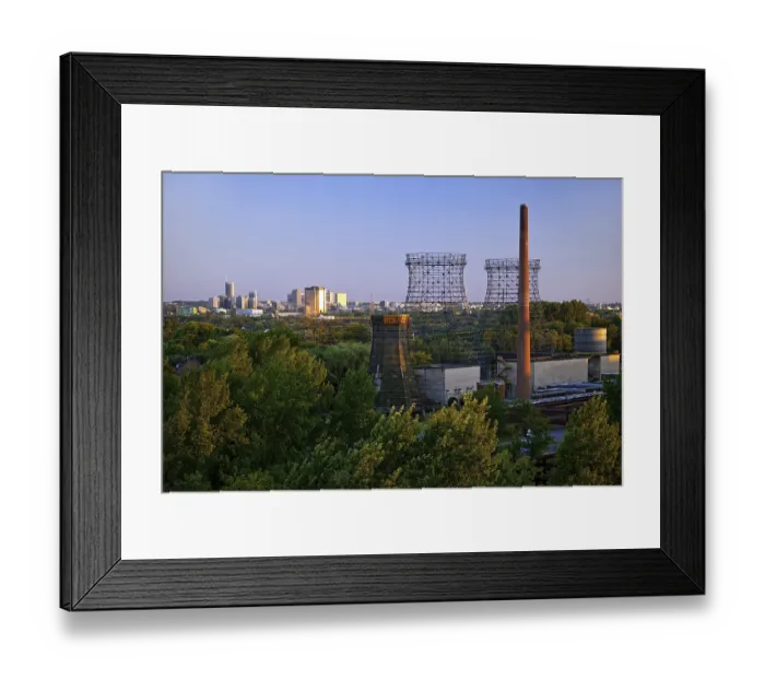 Framed Print : Cooling towers of the Zollverein coking plant and the skyline of the city centre