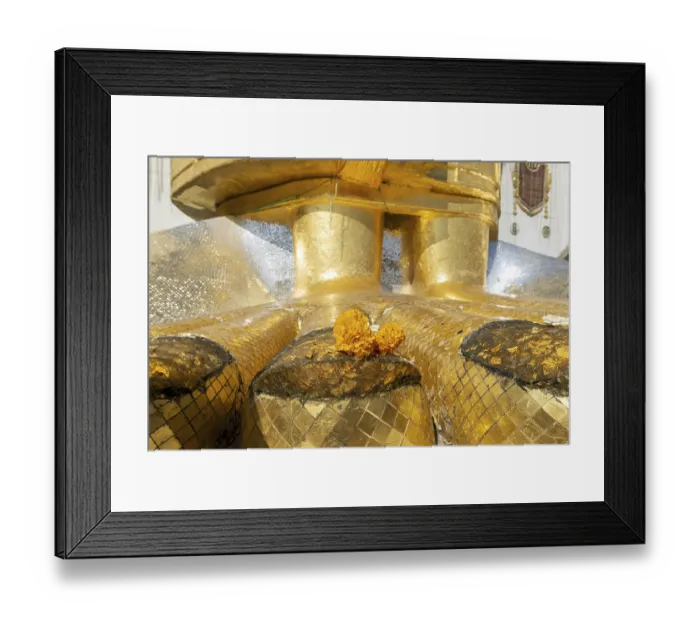 Framed Print : Feet of a 32 metre high standing Buddha decorated with glass mosaics and 24-carat gold