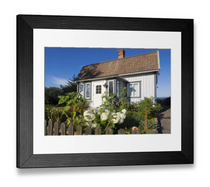 Framed Print : Wooden house with front garden in the small place Framed Print : Wooden house with front garden in the small place