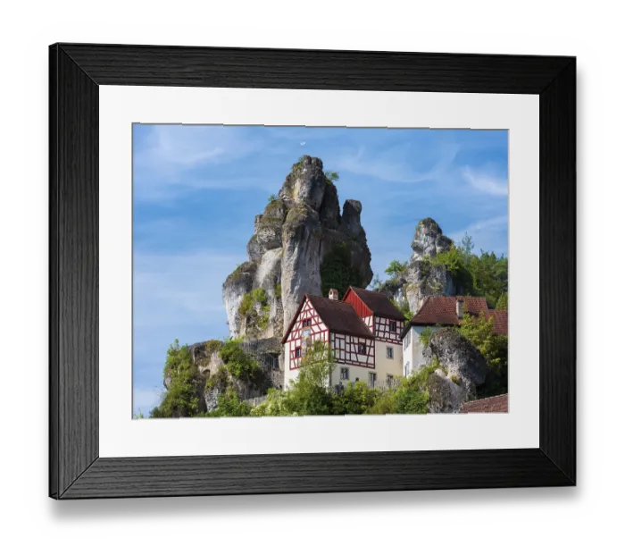 Framed Print : Zechenstein rock formation and half-timbered houses