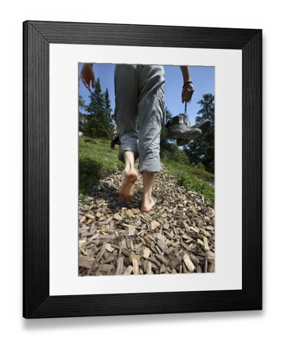 Framed Print : Legs of a barefoot hiker, adventure hiking trail
