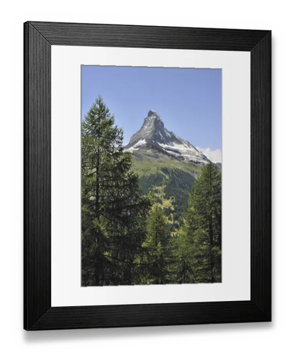 Framed Print : View over the Matterhorn mountain with alpine meadows and pine forests near Zermatt Framed Print : View over the Matterhorn mountain with alpine meadows and pine forests near Zermatt