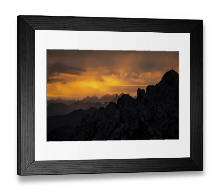 Framed Print : Montafon mountains with dramatic cloudy sky at sunrise
