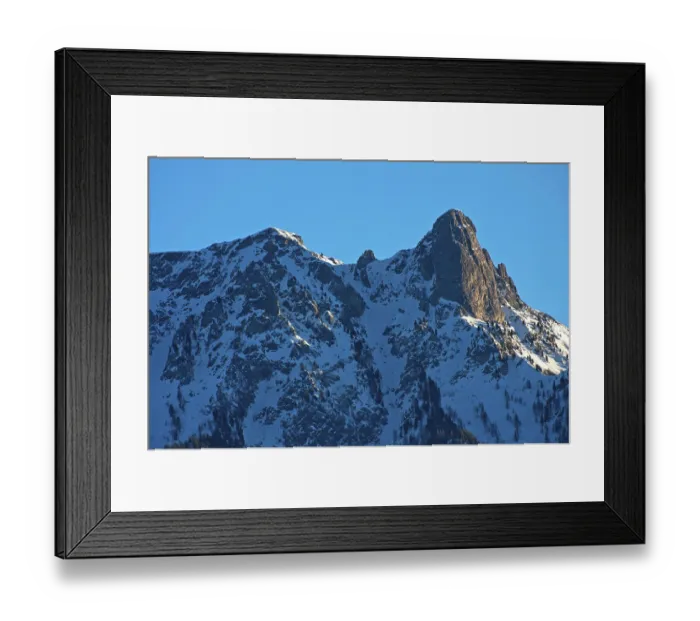 Framed Print : Snow-covered mountain range with the summit Pierre Avoi