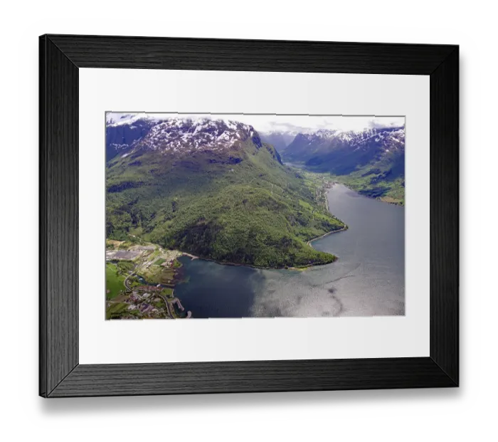 Framed Print : Breathtaking panorama of a fjord with snow-capped mountains and dense forests