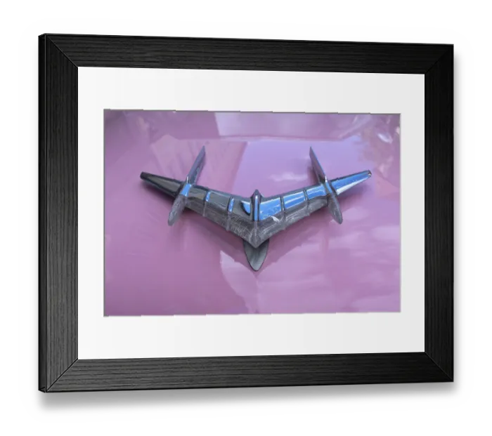 Framed Print : Emblem, hood figure on the pink Pontiac